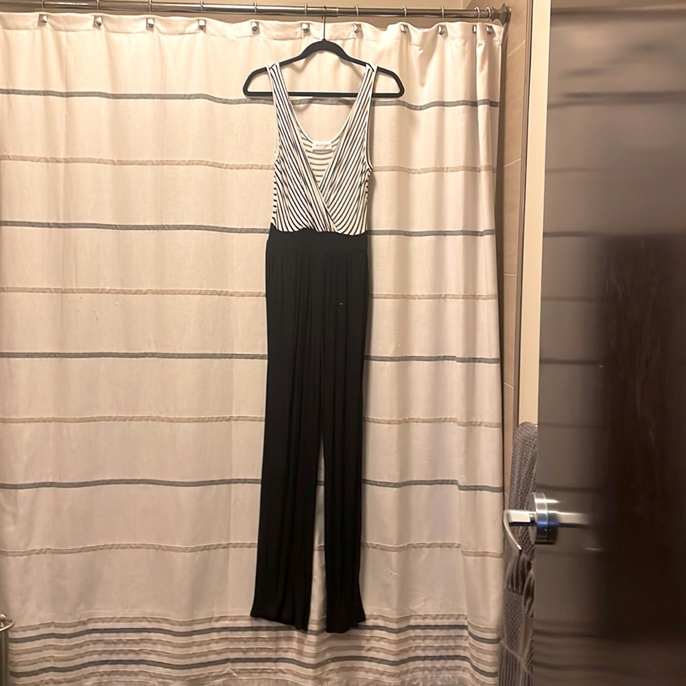 Womens jumpsuit with pockets. Brand is Kaileigh and size is Medium